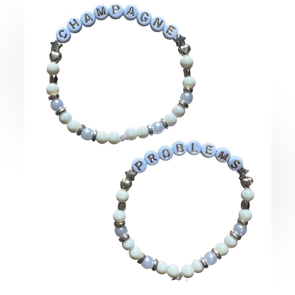 5 for $20 Taylor Swift Handmade Friendship Beaded Bracelet
“Champagne Problems”